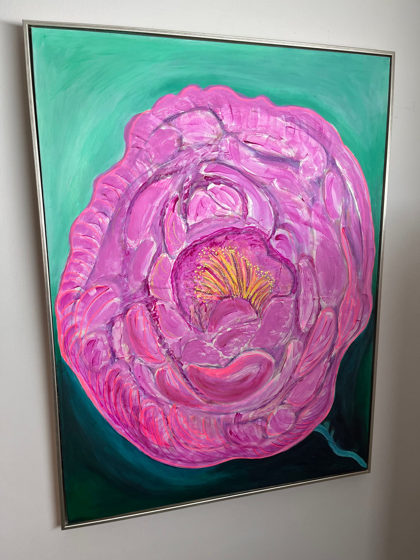 In Bloom ,floral pinks,green background.